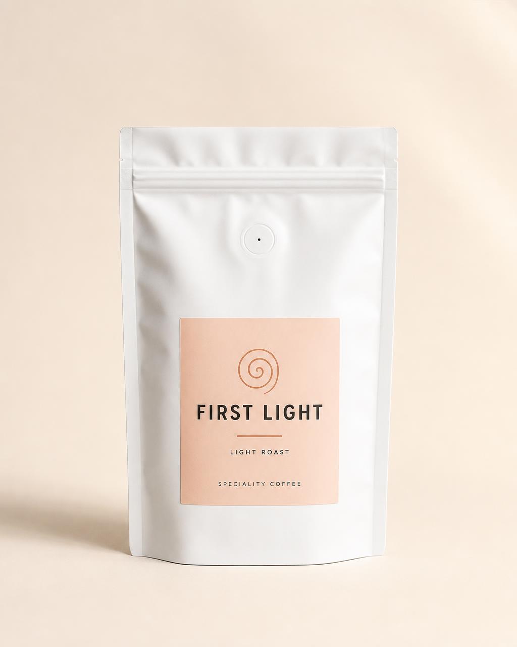 First Light, medium roast speciality coffee in a matte white pouch